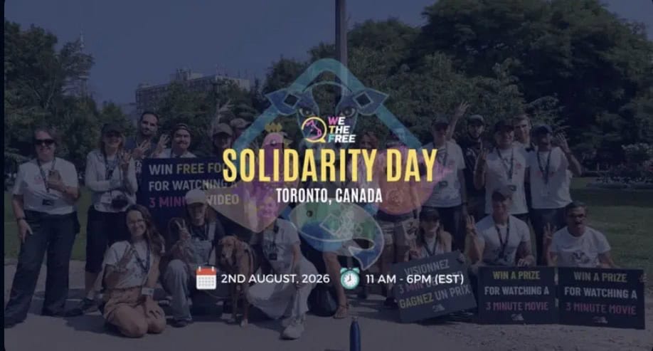 Group of diverse activists participating in Solidarity Day event in Toronto, Canada, promoting animal rights and veganism.